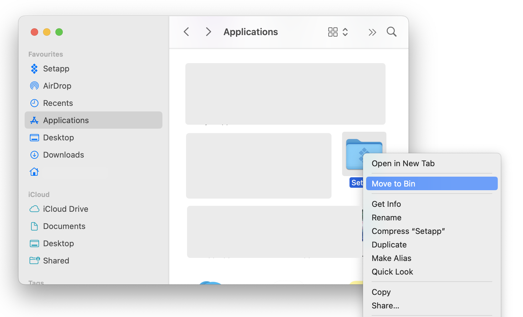  Screenshot displays: Applications, the secondary click on the Setapp folder, the Move to bin option in the context menu.